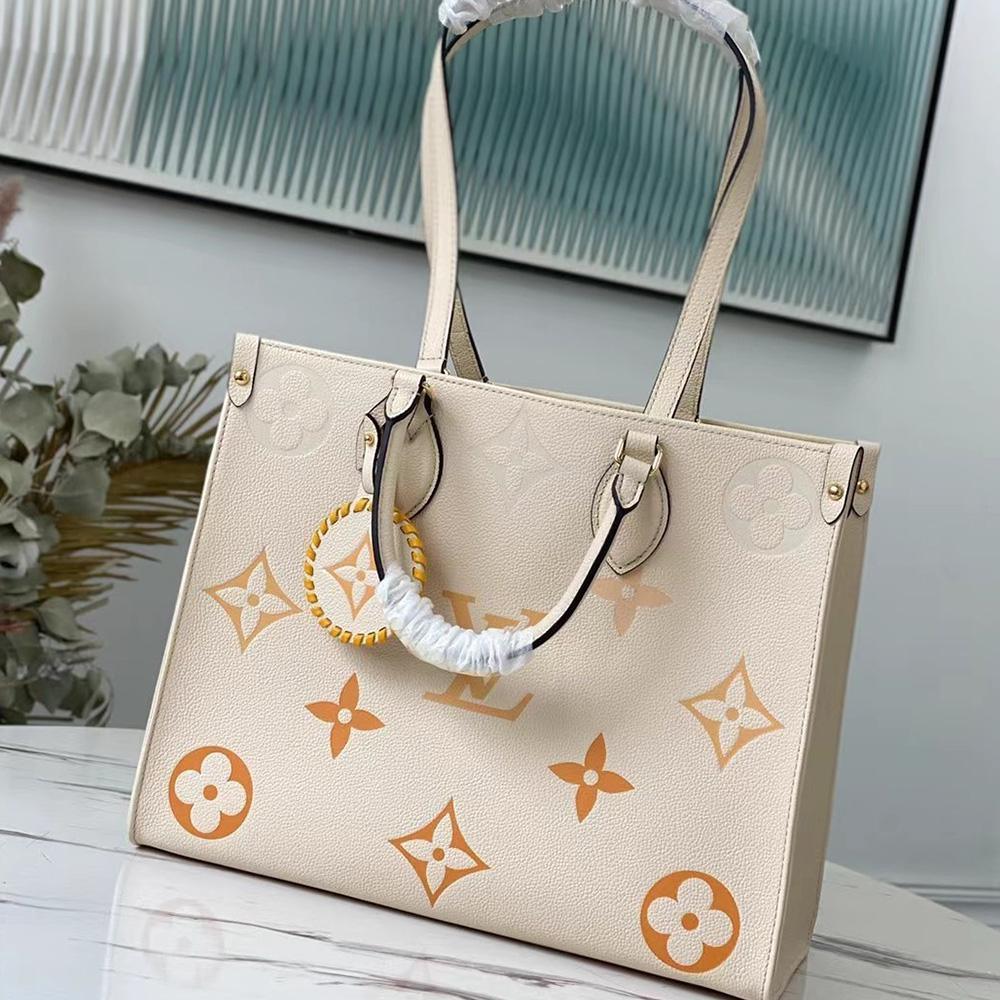 Louis Vuitton OnTheGo MM Tote Bag - Cream Saffron
