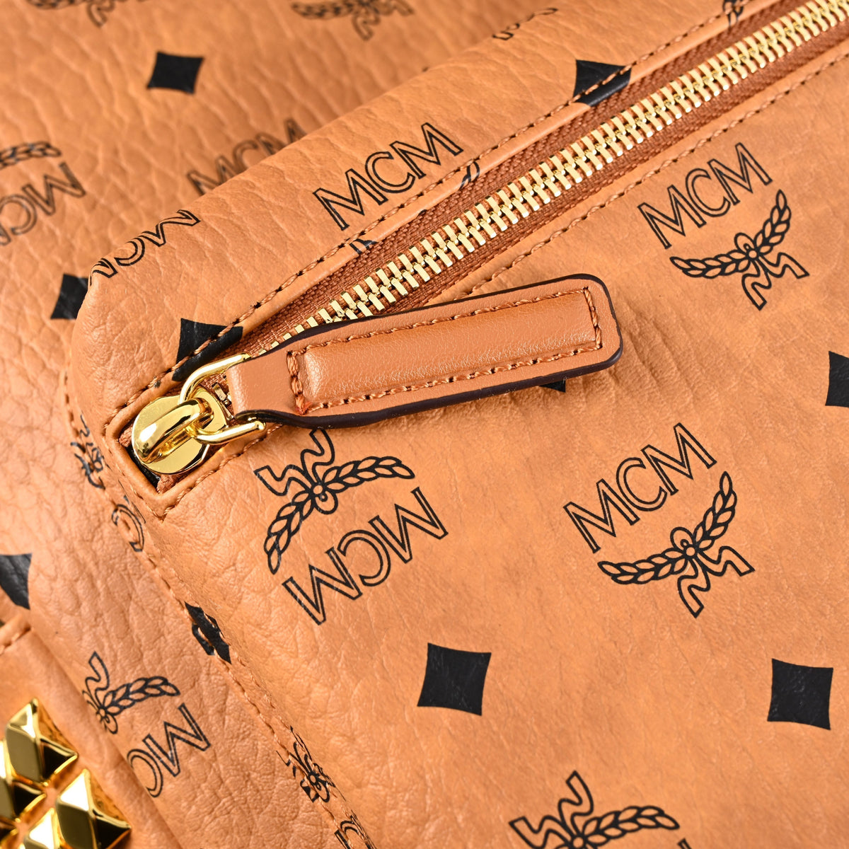 Mcm Stark Visetos Medium Backpack – Cognac Monogram with Gold-Tone Studs - Cognac with Black Monogram Print